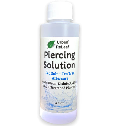 Urban ReLeaf Piercing Solution – Beruhigende Meersalze & Teebaumöl Nachsorge 118 ml, gebrauchsfertig. Reinigt und beruhigt neue & gedehnte Piercings sicher. Sanft, wirksam, natürlich & bewährt. Wirkt schnell