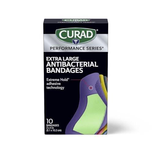 CURAD Performance Series IRONMAN Antibakterielle Pflaster – Extreme Hafttechnologie, extra große flexible Stoffpflaster für Schnitte, Schürfwunden & Verbrennungen, gemischte Farben, 2 x 4 Zoll, 10 Stück