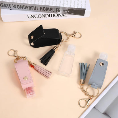 ZEYIYER 3er Set Nachfüllbare Mini-Flaschen Schlüsselanhänger, 30 ml Handdesinfektionsmittel-Halter, Reise-1oz-Behälter für Lotion, Flüssigseife, Shampoo (Blau, Pink, Schwarz)